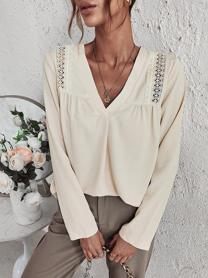 Crème blouse met v-hals