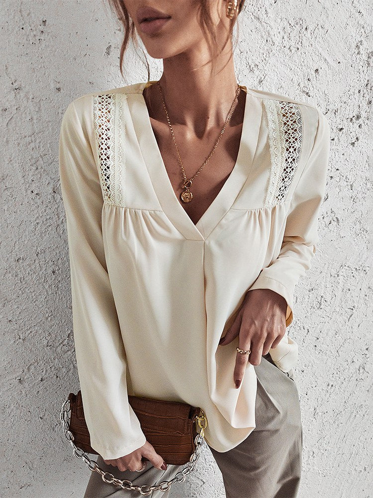 Crème blouse met v-hals