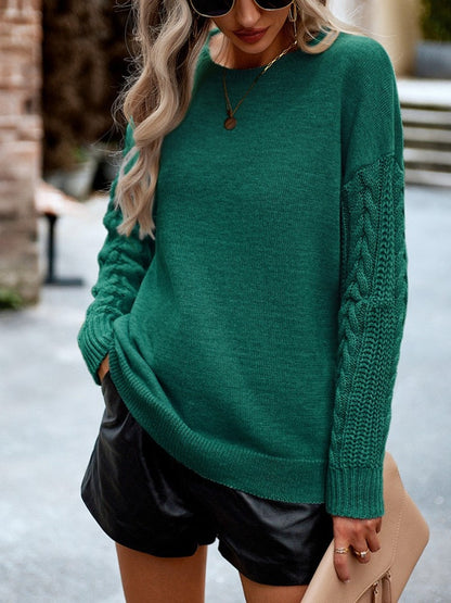 Groene trui met knitted mouwen
