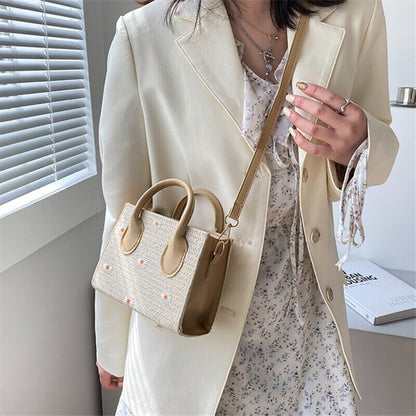 Daisy | Geweven handtas met bloemenaccenten