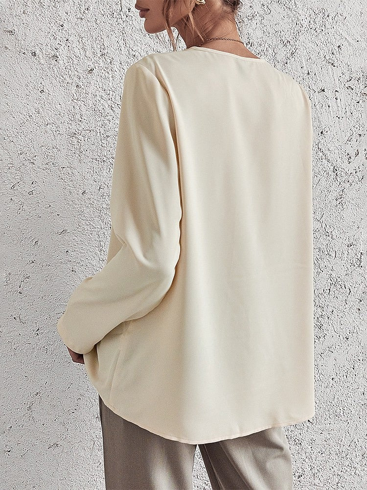 Crème blouse met v-hals