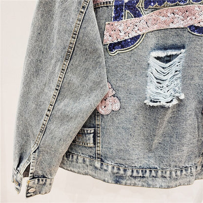 Oversized spijkerjasje met glitters