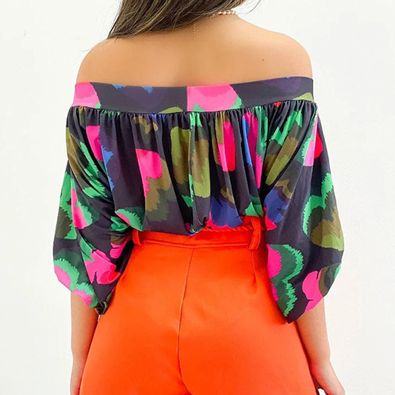 Zwarte off-shoulder blouse met gekleurde print