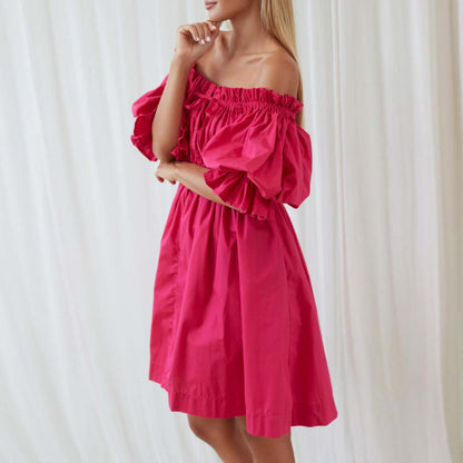 Roze off-shoulder jurk met pofmouwen