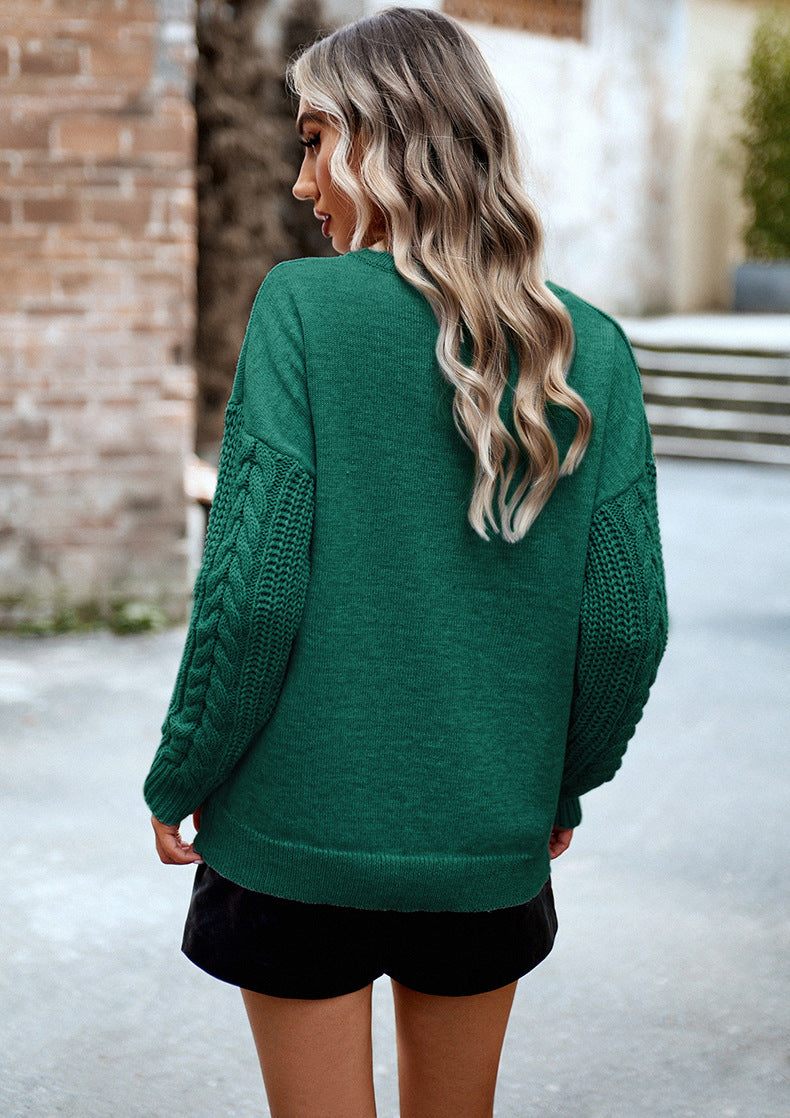 Groene trui met knitted mouwen