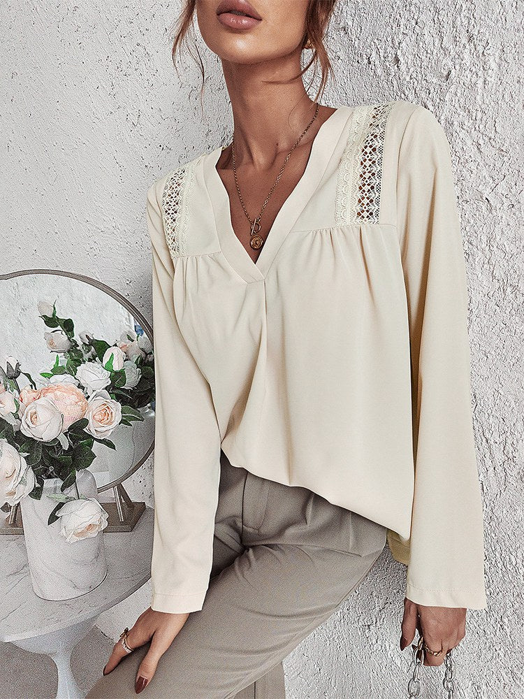 Crème blouse met v-hals