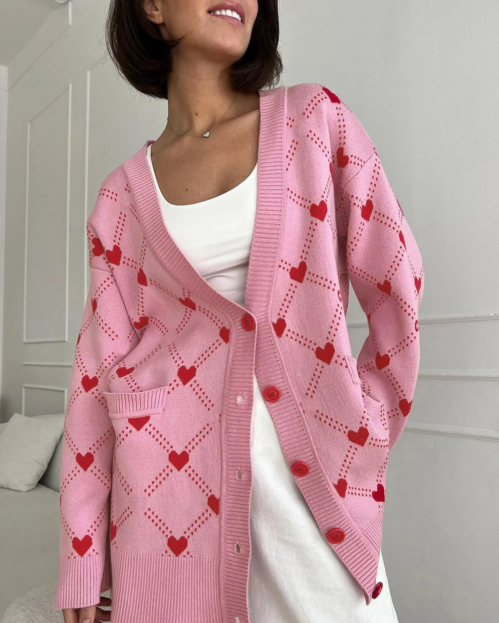Koray | Roze oversized vest met hartpatroon