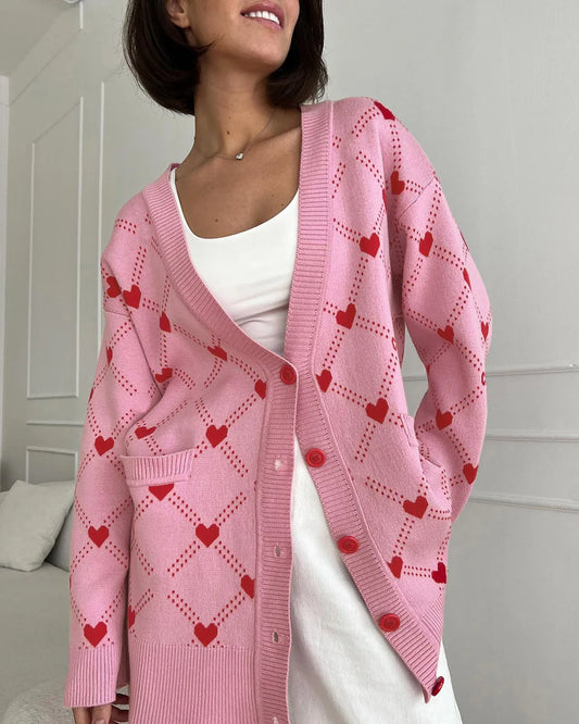 Koray | Roze oversized vest met hartpatroon