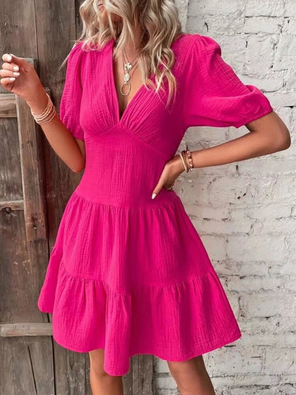 Roze crinkle jurk met ruches