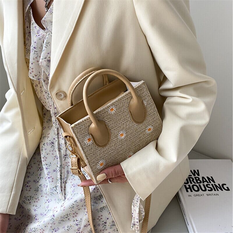 Daisy | Geweven handtas met bloemenaccenten
