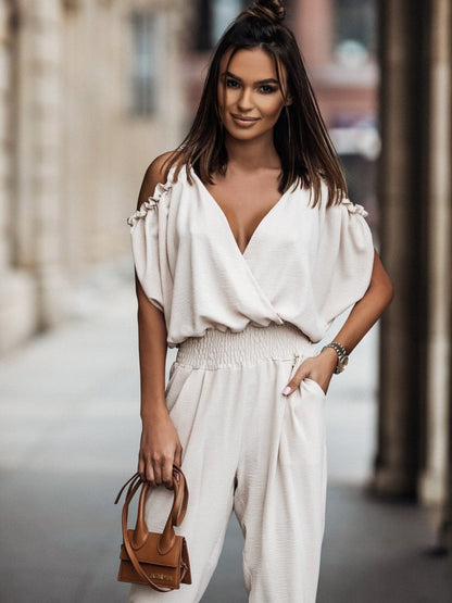 Dahlia | Elegante off shoulder jumpsuit met zakken
