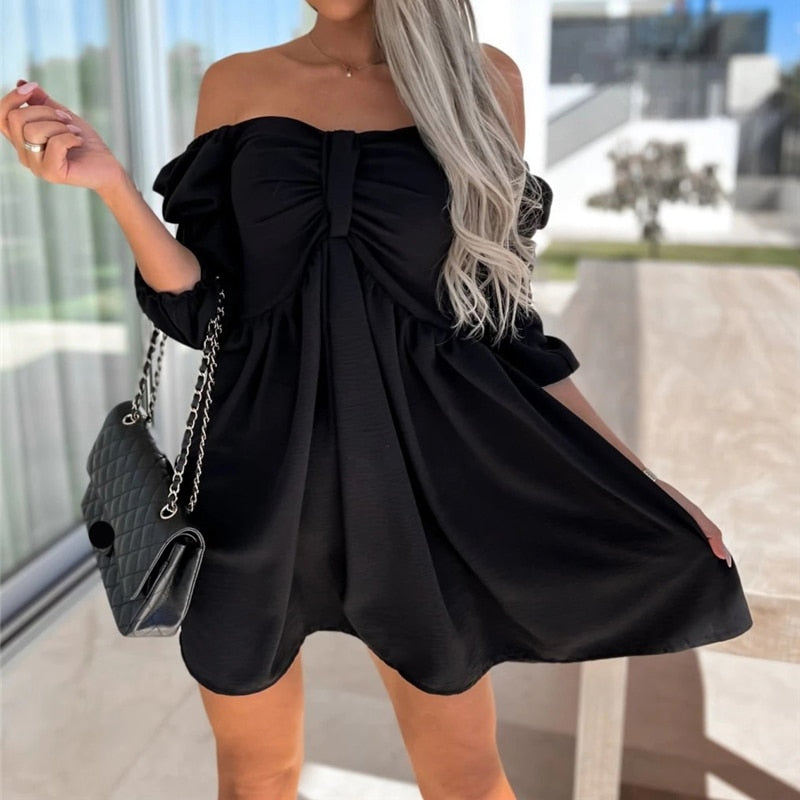 Off-shoulder jurk strik