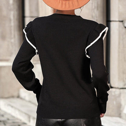 Zwarte trui met ruffles
