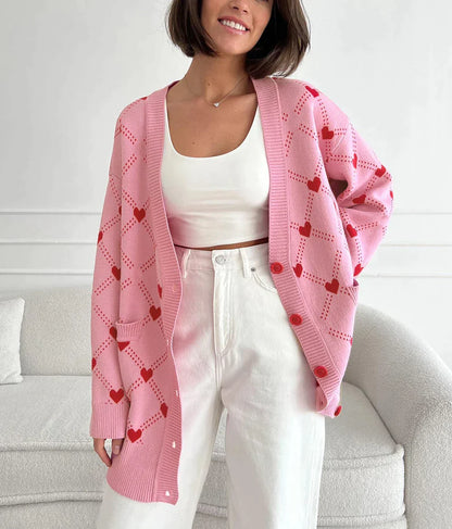 Koray | Roze oversized vest met hartpatroon