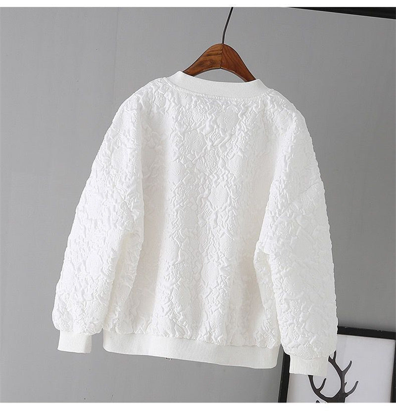 Wit bomberjack met patroon