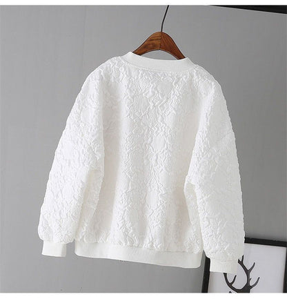 Wit bomberjack met patroon