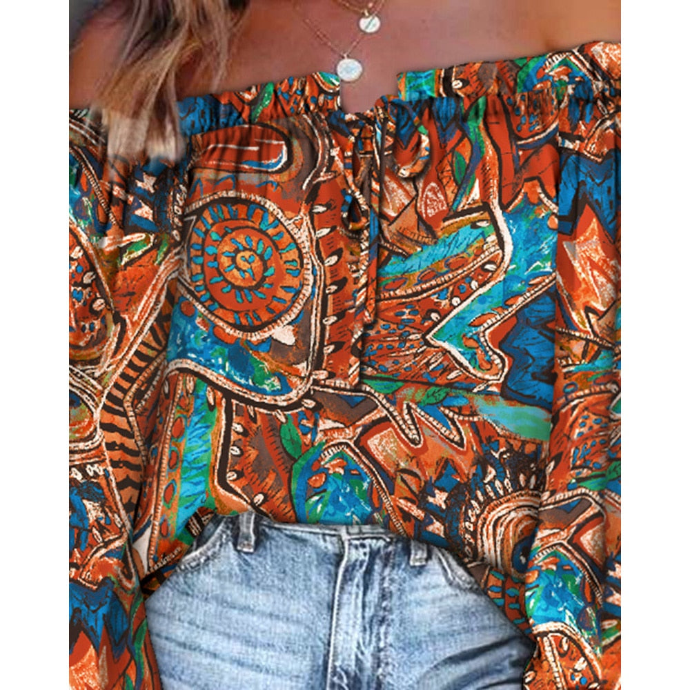 Off-shoulder top met print
