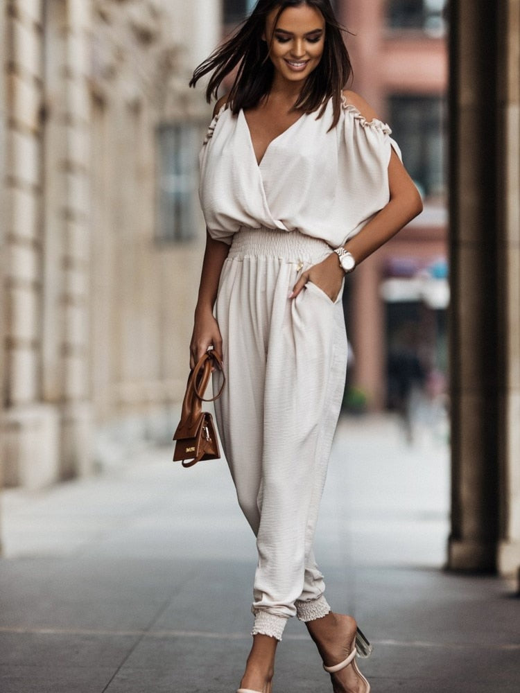 Dahlia | Elegante off shoulder jumpsuit met zakken