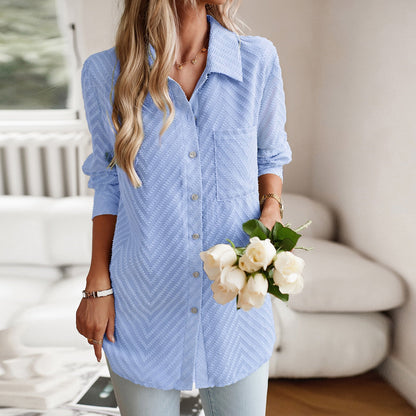 Lichtblauwe blouse met patroon