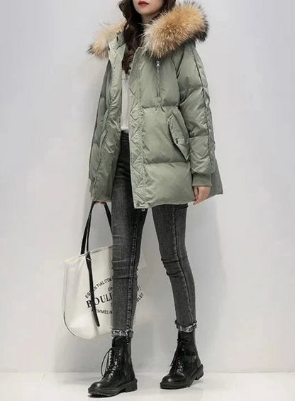 Julie | Mooie warme winterjas met capuchon van imitatiebont voor vrouwen
