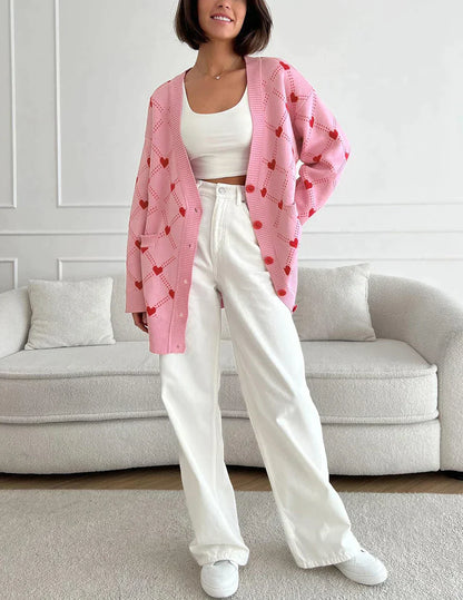 Koray | Roze oversized vest met hartpatroon