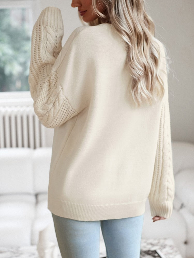Beige trui met knitted mouwen