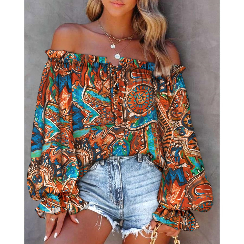 Off-shoulder top met print