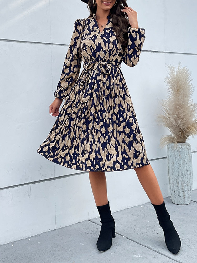 Donkerblauwe midi jurk met beige print