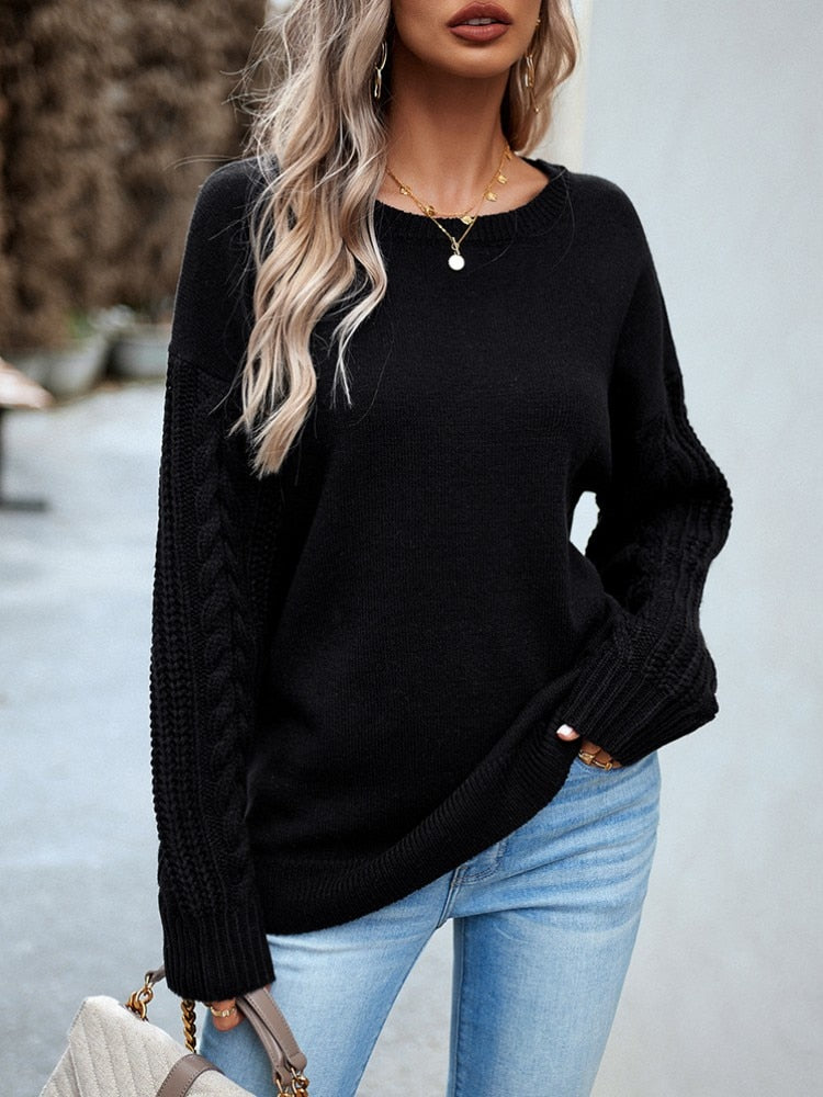 Zwarte trui met knitted mouwen