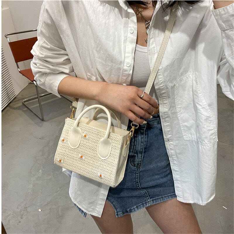 Daisy | Geweven handtas met bloemenaccenten