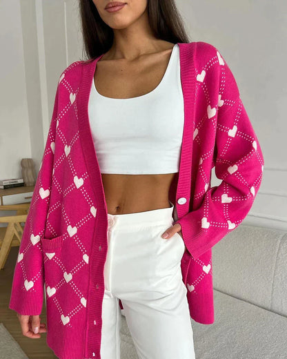 Koray | Roze oversized vest met hartpatroon