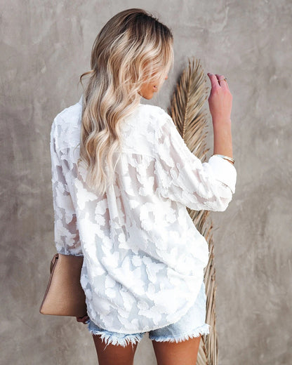 Witte blouse met patroon