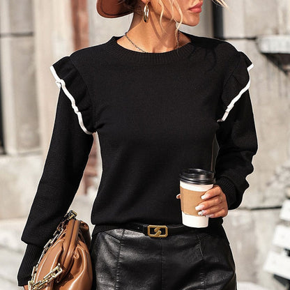 Zwarte trui met ruffles