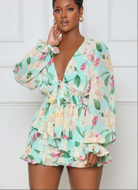 Mintgroene playsuit met bloemenprint