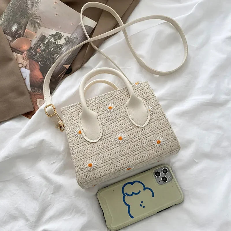 Daisy | Geweven handtas met bloemenaccenten