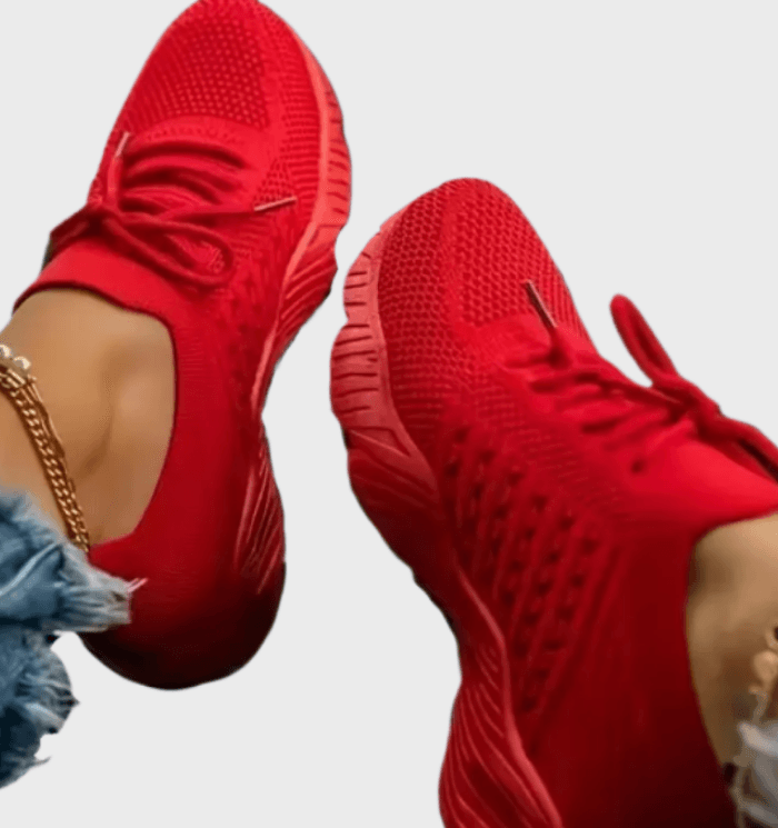 Sarah -  Enkelkleurige hardloopsneakers met veters