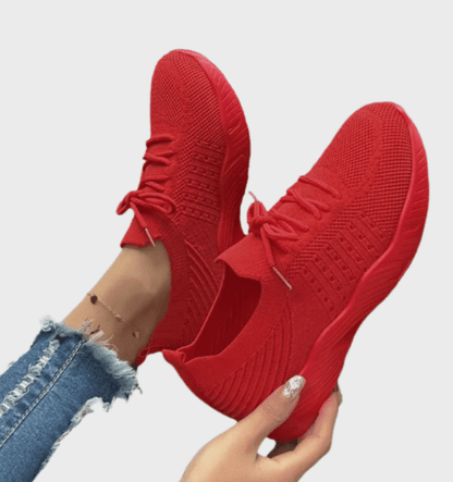 Sarah -  Enkelkleurige hardloopsneakers met veters