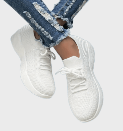 Sarah -  Enkelkleurige hardloopsneakers met veters