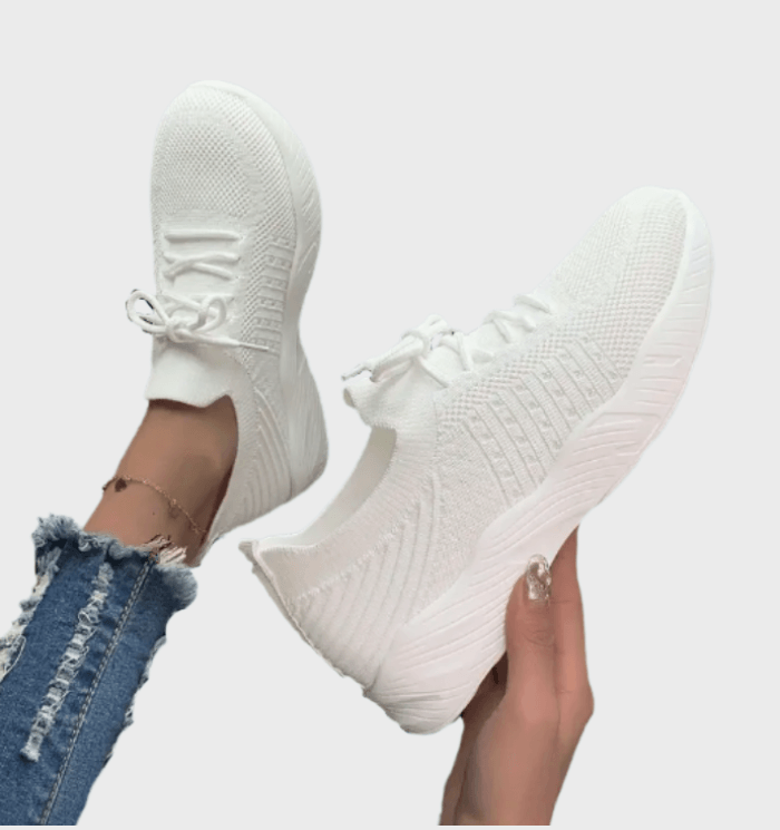 Sarah -  Enkelkleurige hardloopsneakers met veters