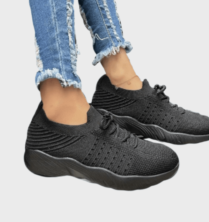 Sarah -  Enkelkleurige hardloopsneakers met veters