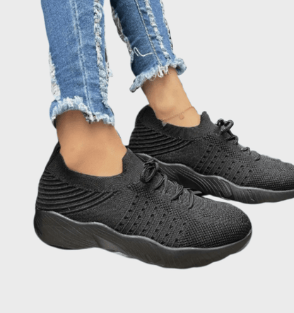 Sarah -  Enkelkleurige hardloopsneakers met veters
