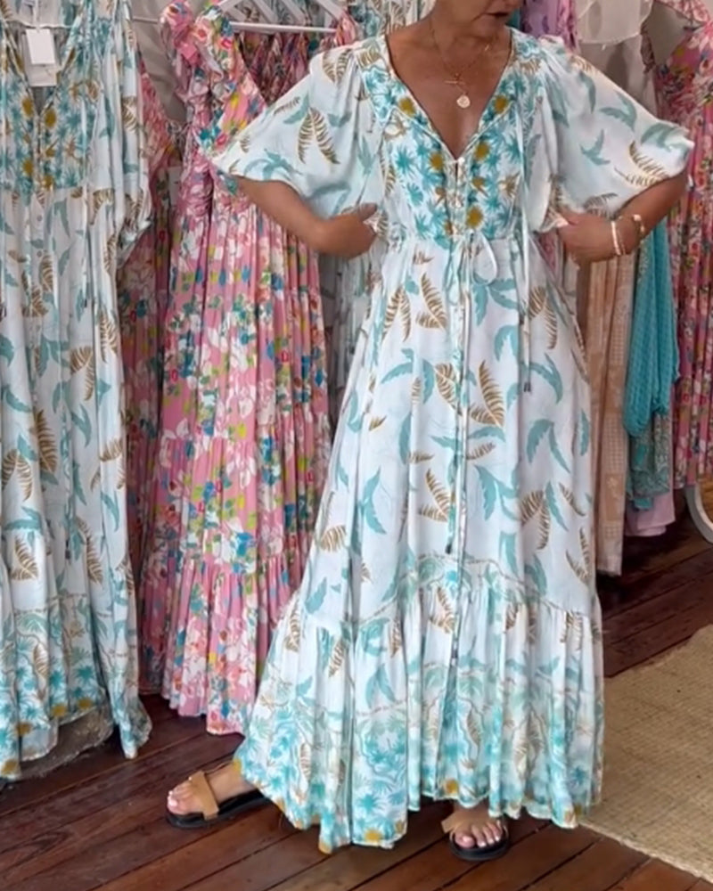 Amita - Maxi-jurk voor dames met een bladprint en een elegante V-hals