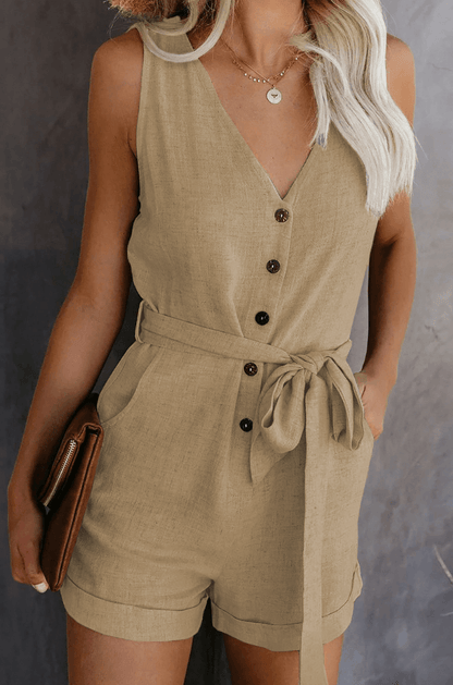 Olivia | mouwloze romper met knoopsluiting en strikceintuur