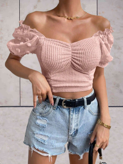 Chelsea - Bodycon cropped top met lage v-uitsnijding en gezwollen korte mouwen