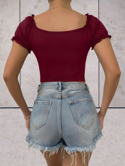 Chelsea - Bodycon cropped top met lage v-uitsnijding en gezwollen korte mouwen