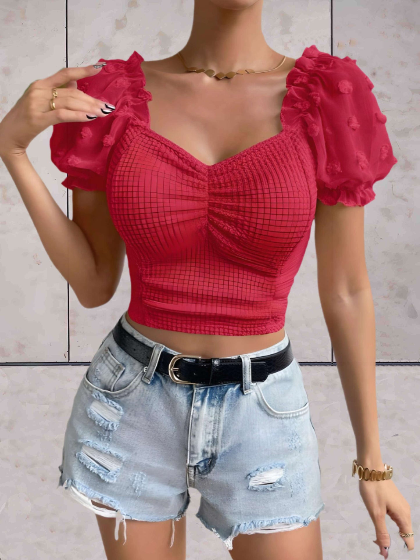 Chelsea - Bodycon cropped top met lage v-uitsnijding en gezwollen korte mouwen