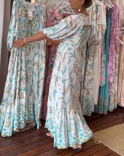 Amita - Maxi-jurk voor dames met een bladprint en een elegante V-hals