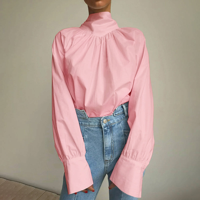 Roze blouse met strik