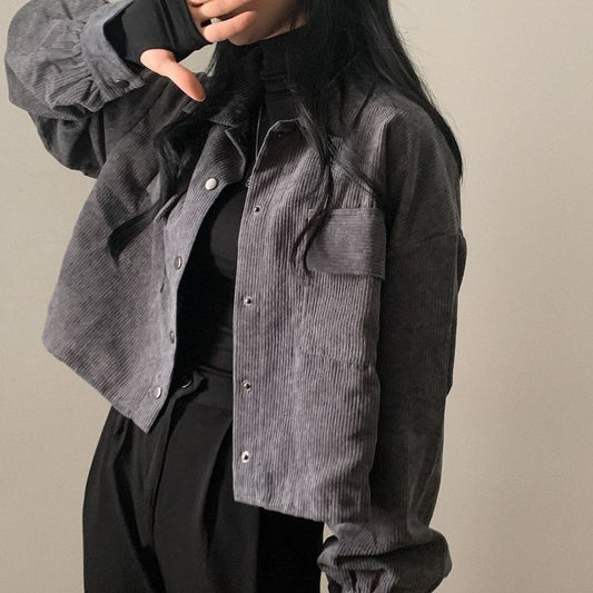 Donkergrijze ribfluwelen jas