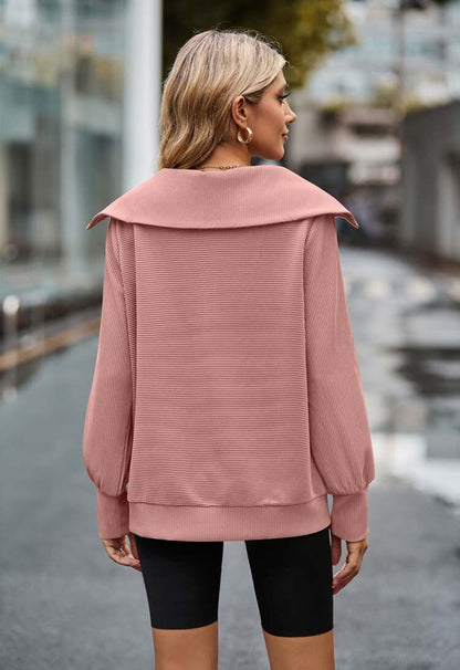 Roze sweater met rits